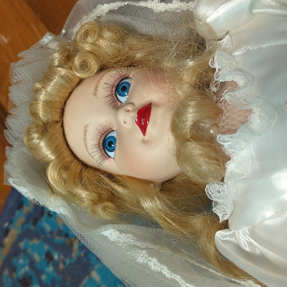 Gorgeous Bride porcelain doll. Kept in pristine condition by me.